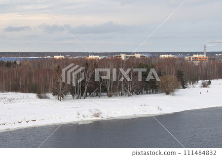 river on a sunny evening. Trees and shrubs. Landscape of winter nature, river banks river on a sunny evening. Trees and shrubs. Landscape of winter nature, river banks 111484832