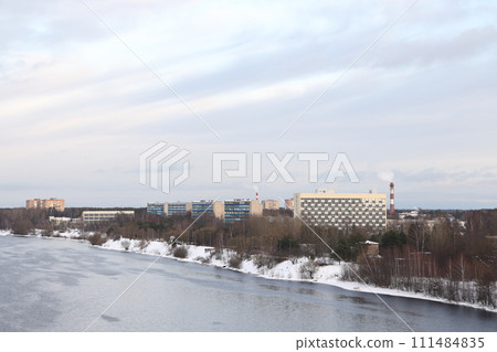 river on a sunny evening. Trees and shrubs. Landscape of winter nature, river banks river on a sunny evening. Trees and shrubs. Landscape of winter nature, river banks 111484835