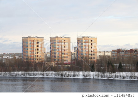 river on a sunny evening. Trees and shrubs. Landscape of winter nature, river banks  111484855