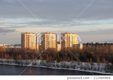 river on a sunny evening. Trees and shrubs. Landscape of winter nature, river banks with bushes. river on a sunny evening. Trees and shrubs. Landscape of winter nature, river banks with bushes. 111484969