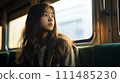 Asian students riding the train 111485230