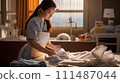 Asian woman cleaning a hotel 111487044