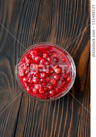 Bowl of lingonberry sauce 111488125