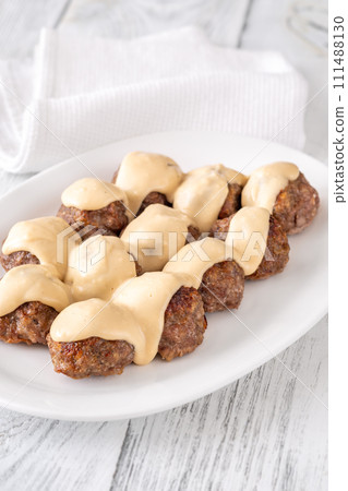 Swedish meatballs with cream sauce Swedish meatballs with cream sauce 111488130