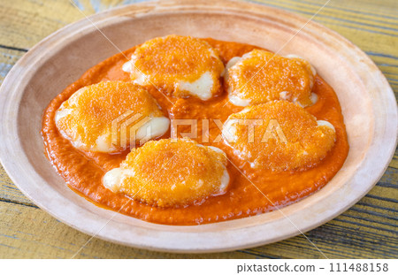 Nuggets with melted camembert 111488158