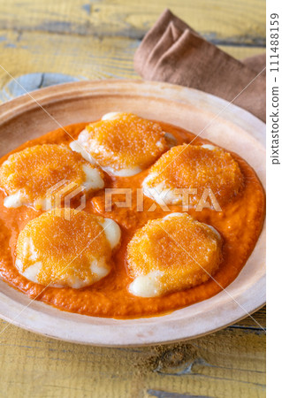 Nuggets with melted camembert 111488159