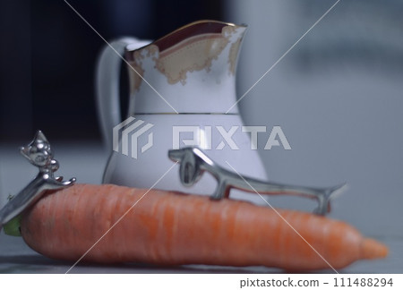 carrots and toy cats carrots and toy cats 111488294