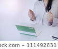 Image of a woman posing happy looking at her bankbook 111492631