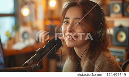 Artist singing in front of a computer 111493549