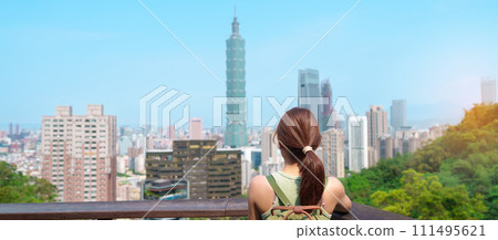 woman traveler visiting in Taiwan, Tourist looking Taipei City during sightseeing and hiking at Elephant Mountain or Xiangshan, landmark and popular attractions. Asia Travel, vacation and Trip concept woman traveler visiting in Taiwan, Tourist looking Taipei City during sightseeing and hiking at Elephant Mountain or Xiangshan, landmark and popular attractions. Asia Travel, vacation and Trip concept 111495621