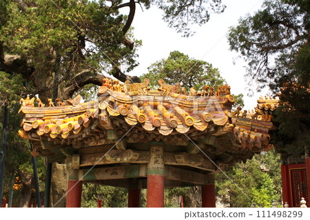 Roof of ancient pavilion in Forbidden City. Clay tile roof with traditional Chinese decorations, Forbidden City, Beijing, China Roof of ancient pavilion in Forbidden City. Clay tile roof with traditional Chinese decorations, Forbidden City, Beijing, China 111498299