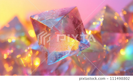 A close-up of a radiant geometric crystal showcasing a spectrum of holographic colors. 111498802