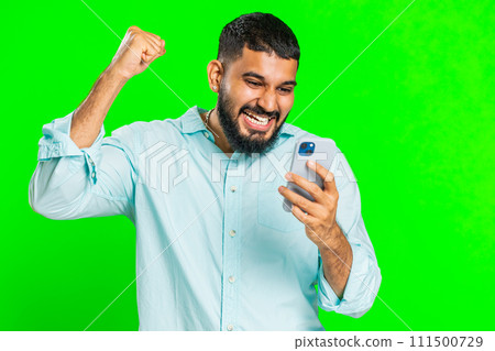 Happy excited winner man use smartphone celebrating success, winning play game, good lottery news Happy excited winner man use smartphone celebrating success, winning play game, good lottery news 111500729