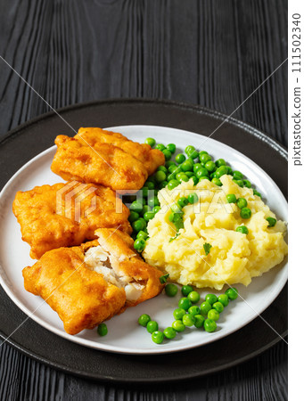 fried fish with mashed potatoes and green peas fried fish with mashed potatoes and green peas 111502340