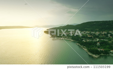 Aerial view of the beaches and forest park Marjan close to city of Split at sunset, Croatia Aerial view of the beaches and forest park Marjan close to city of Split at sunset, Croatia 111503199