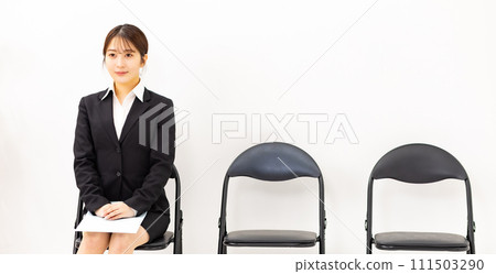 Young woman business 20s sitting 111503290