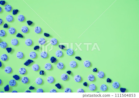 Blue azure stones pebble gems pattern.Green space for advertising text 111504853
