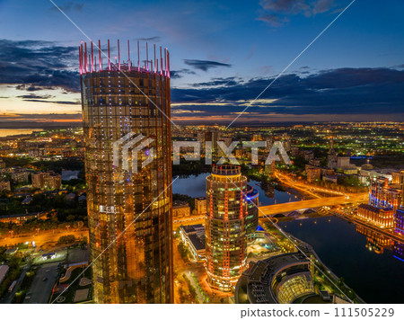 Yekaterinburg city and pond aerial panoramic view at summer or early autumn night. Night city in the early autumn or summer. 111505229