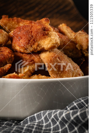 Fried crispy chicken nuggets 111505339