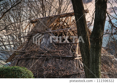 A restored ancient dwelling that is on the verge of collapsing 111506322