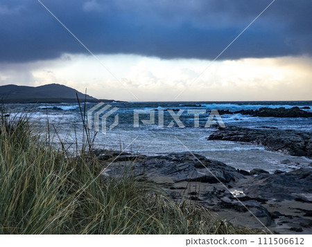 Dramatic clouds at Carrickfad by Portnoo at Narin Strand in County Donegal Ireland Dramatic clouds at Carrickfad by Portnoo at Narin Strand in County Donegal Ireland 111506612