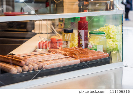 Sausages grilled and sold in kitchen cars around town in Vienna, Austria Sausages grilled and sold in kitchen cars around town in Vienna, Austria 111506816