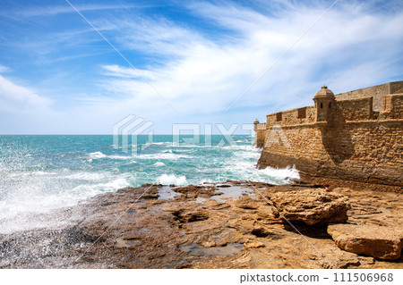 La Caleta Beach, Balneario de la Palma Building and Castle of San Sebastian at sunset - Cadiz, Andalusia, Spain 111506968