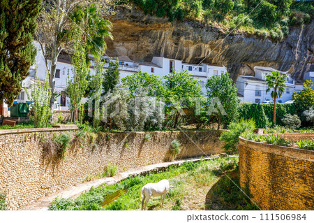 The beautiful village of Setenil de las Bodegas on a sunny summer day. Provice of Cadiz, Andalusia, Spain The beautiful village of Setenil de las Bodegas on a sunny summer day. Provice of Cadiz, Andalusia, Spain 111506984
