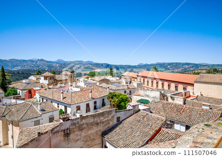 Ronda ind Andalusia, Spain. View from above on the touristic city, houses and roofs. 111507046