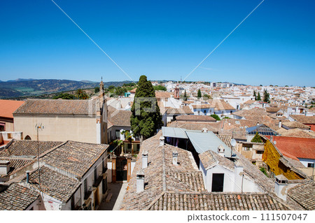Ronda ind Andalusia, Spain. View from above on the touristic city, houses and roofs. 111507047