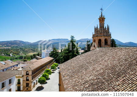 Ronda ind Andalusia, Spain. View from above on the touristic city, houses and roofs. 111507048