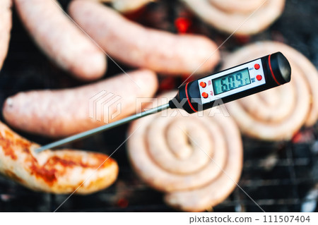 Grilling Sausages with Digital Thermometer 111507404
