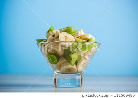 fruit salad of bananas and kiwi 111509490