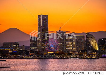 Japan's Yokohama cityscape Minato Mirai and Mt. Fuji reflected in the sunset. Back left is towards Sakuragicho Station Japan's Yokohama cityscape Minato Mirai and Mt. Fuji reflected in the sunset. Back left is towards Sakuragicho Station 111510910