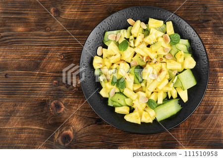 Diet pineapple and cucumber salad. 111510958