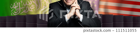 Politician or businessman on oil barrels background and background of Saudi Arabia and USA flags Politician or businessman on oil barrels background and background of Saudi Arabia and USA flags 111511055
