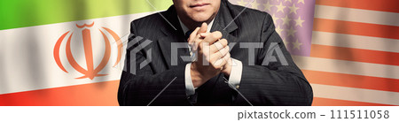 Politician or businessman on background of Iran and America flags 111511058