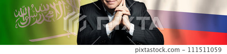 Politician or businessman on  background of Saudi Arabia and Russia flags 111511059