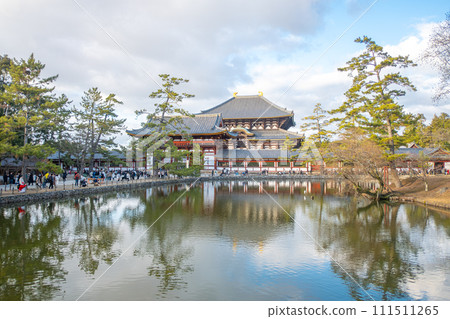 Todai-ji Chumon gate. Buddhist temple featuring a large Buddha statue in Nara, Japan Todai-ji Chumon gate. Buddhist temple featuring a large Buddha statue in Nara, Japan 111511265