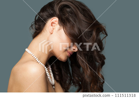 Glamorous stylish brunette fashion model with makeup, wavy hairstyle and healthy clean skin posing Glamorous stylish brunette fashion model with makeup, wavy hairstyle and healthy clean skin posing 111511318