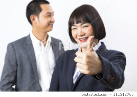 Asians executive businessman and businesswoman smile and standing on white background. Asians executive businessman and businesswoman smile and standing on white background. 111512763