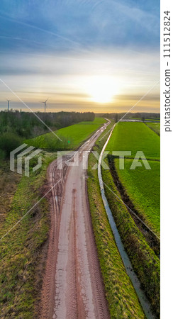 Aerial Shot of Curvy Rural Path at Dawn Aerial Shot of Curvy Rural Path at Dawn 111512824