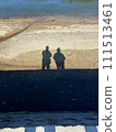 shadow of two people 111513461