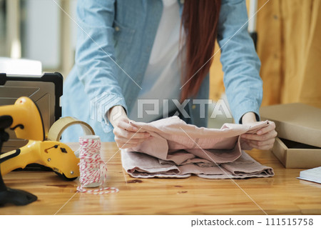 Small Business Owner Preparing Order for Shipment Small Business Owner Preparing Order for Shipment 111515758