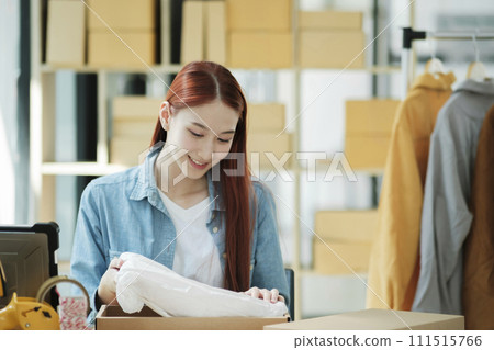 Small Business Owner Preparing Order for Shipment Small Business Owner Preparing Order for Shipment 111515766