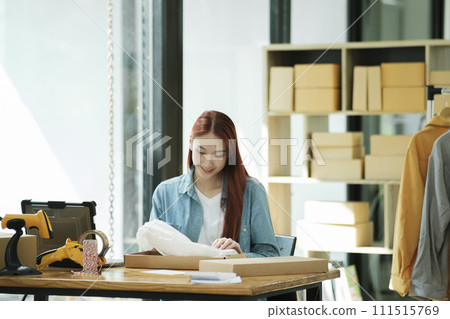 Small Business Owner Preparing Order for Shipment Small Business Owner Preparing Order for Shipment 111515769