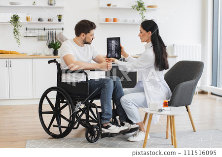 Portrait of Caucasian woman doctor checking up condition of mature male patient. Portrait of Caucasian woman doctor checking up condition of mature male patient. 111516095