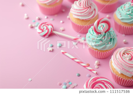 Pink table top on pink background with decorated lollipops and cupcakes, children birthday party Pink table top on pink background with decorated lollipops and cupcakes, children birthday party 111517586
