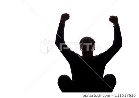 Sitting man's hands showing a victory Sitting man's hands showing a victory 111517636