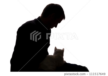 Young man with a kitten in his hands 111517649
